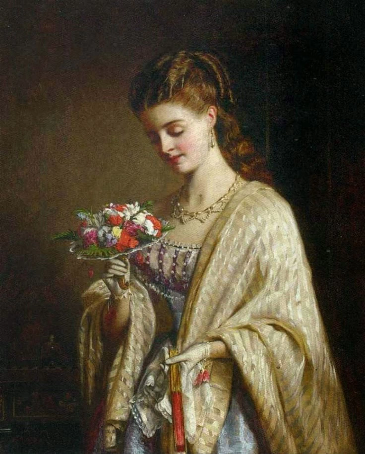 Giovane donna con mazzolino di fiori